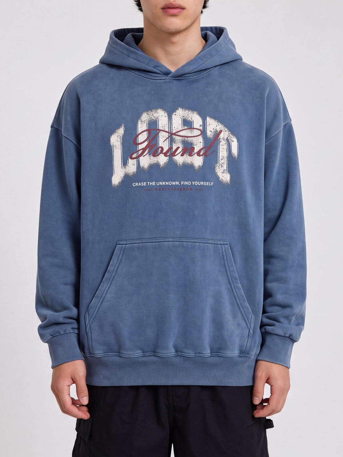 Front view of a blue Lost & Found washed hoodie with dropped shoulders and a kangaroo pocket.